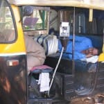 rickshaw driver taking a nap in Bangalore rickshaw driver taking a nap in Bangalore