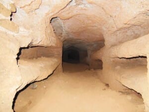 Walking through the narrow corridor of the Jewish Rome catacombs